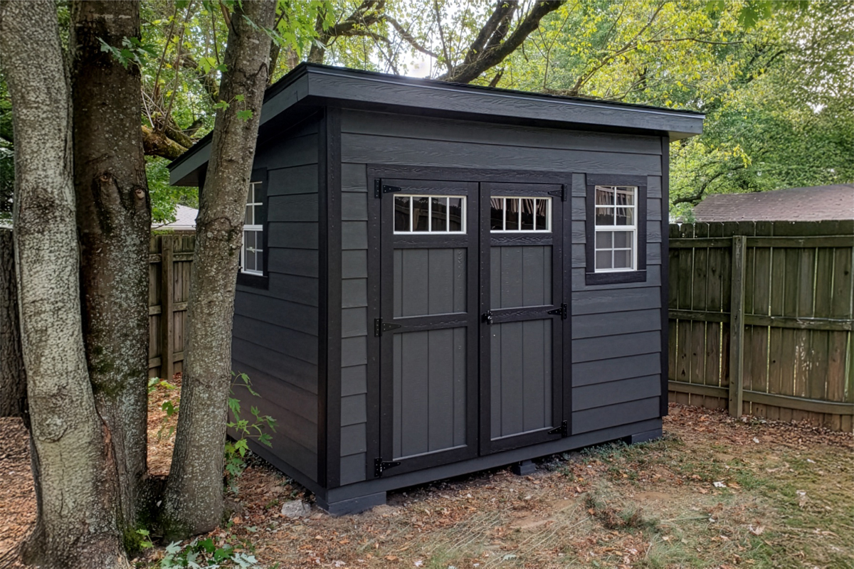 Black painted lean-to shed